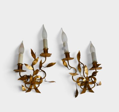 pair of brass wall sconces with flowers and leaves