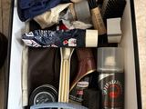 a box with a lot of cleaning supplies inside of it