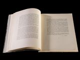 an open book that is sitting on a table