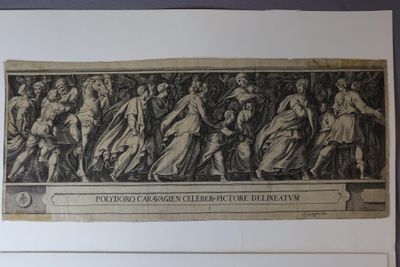 a black and white drawing of a group of people on a wall