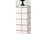 an image of a glass display case with a vase on top of it