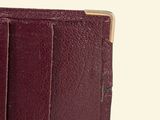 leather wallet with a card holder and two credit cards in it
