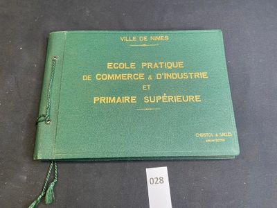 an image of a green book with a tag on top of it