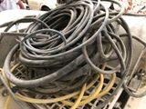 a pile of wires that are on top of a truck