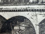 a black and white drawing of a bridge with a horse and buggy