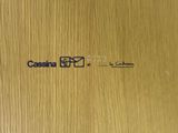 a picture of a close up of a sign on a wooden door