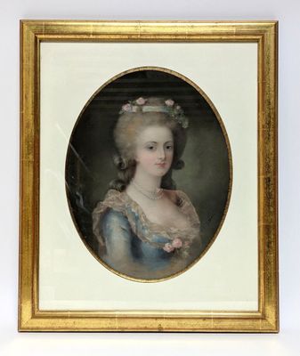 portrait of a lady in a blue dress with a flower in her hair