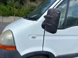 a white van that has a teddy bear on the side of it