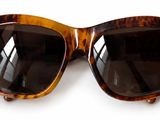 brown sunglasses on a white background with a white background