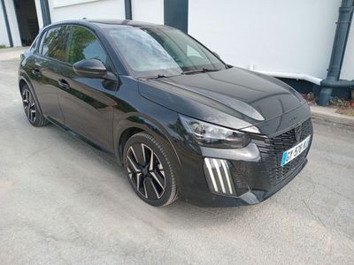 a picture of a black car parked on the side of the road