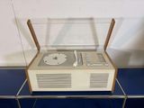a record player that is sitting on top of a table