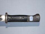 a knife that is sitting on a table