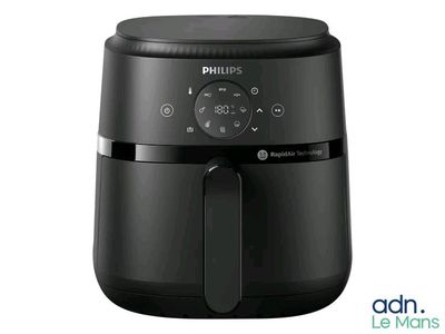 the philips air fryer is black and has a timer on it