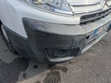 a white van parked on the side of the road