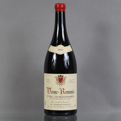 a bottle of wine that is sitting on a table