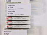 four different types of plastic tags on a piece of paper