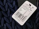 the back of a black jacket with a barcode on it