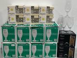 several boxes of wine glasses are stacked on top of each other