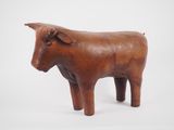 wooden sculpture of a bull on a white background