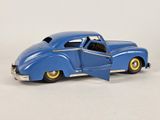 a blue toy car with a door open on a white surface