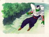 Gohan, de Dragon Ball, volant dans les airs, un couteau à la main