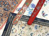 three different types of oriental rugs on a table