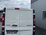 a white van that is parked in a parking lot