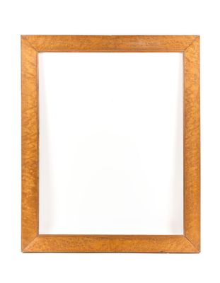 an empty wooden picture frame on a white background