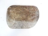 a rock that is sitting on a white surface