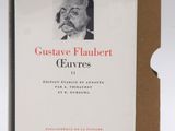 an old book with a picture of a man smoking a cigarette