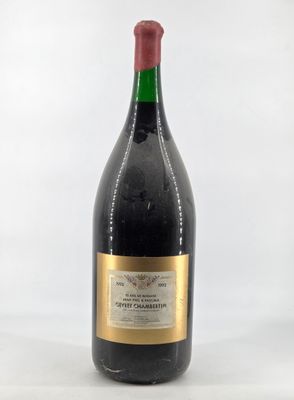 a bottle of wine that is sitting on a table