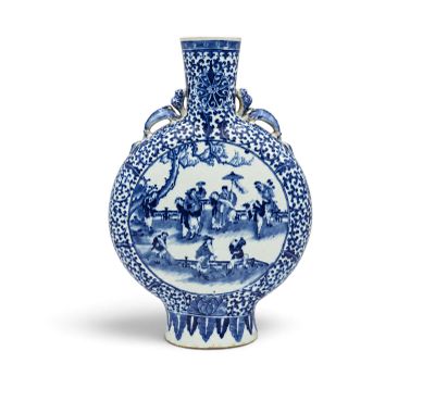 a blue and white vase with a picture of people on it