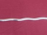 a silver and gold sword on a red cloth