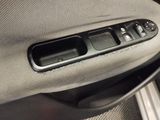 a close up of a car door handle with a remote control