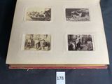 a book with pictures of people on it on a table