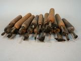 several old wood dows are arranged in a row on a white surface