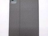the back of a gray case with a camera attached to it