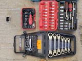 a lot of tools in the case on the floor