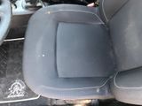 a picture of a car seat with a steering wheel in it