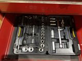 a tool kit in a tool box on a table