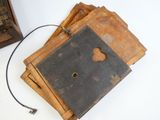 a lot of old books sitting on top of each other