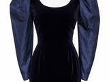 a black velvet dress with puff sleeves on a mannequin mannequin mannequin mannequin mannequin mannequin mannequin manne