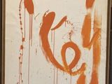 une photo d'un tableau recouvert de peinture orange