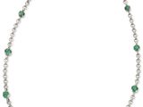 un collier d'émeraudes et de diamants, signé Van Cleef