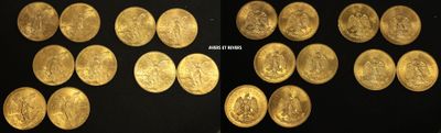 gold coins are arranged in a row on a black surface