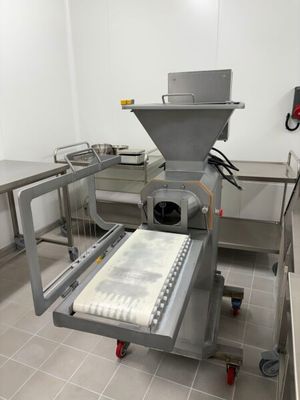 une image représentant une cuisine équipée d'un tapis roulant