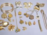 many different types of jewelry on the table