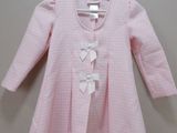pink checkered dress with white bow detail