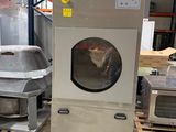 a machine that is sitting in the middle of a warehouse