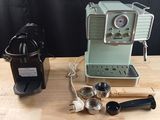 an image of a coffee maker and other kitchen items on a table